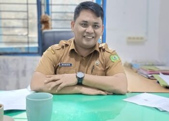 Keterangan gambar ; Dedek Ispensah Siregar.S.Sos Kabid Pelayanan Perhitungan dan penagihan pajak daerah Bapenda Madina